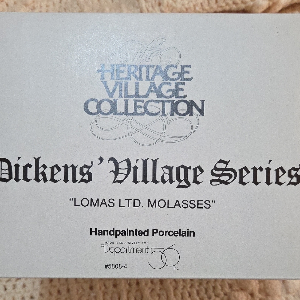 Department 56 Heritage Village Lomas Ltd. Molasses Figurine
